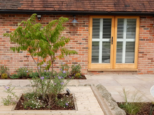 garden design for a converted barn