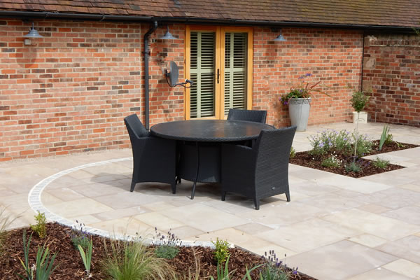 A garden design for a converted barn